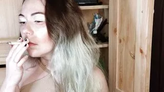 modest stepsister smokes a cigarette