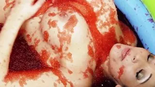 Kissing turns into food wrestling between the two brunette