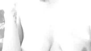 Busty Ashlee Graham smokes while showing off her natural