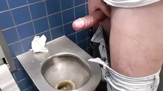 Big fat cock with ring jerk off in public toilete in Germany.