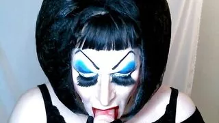 Sissy Slut in Heavy Makeup Sucks and Deep Throats Dildo on Cam