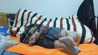 Selfbondage On The Bed