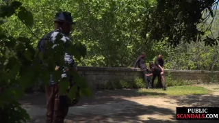 Disgraced shameless slut deepthroats in public 3some outdoor