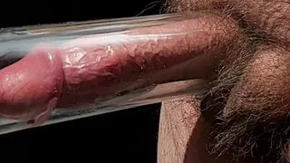 Filling the penis pump full of cock