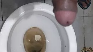 A guys masturbate penis in the bathroom