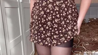 Beauty in sexy pantyhose poses and caresses her holes to orgasm