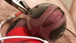 Estim Chastity Cage - 7inch dick stuffed into a one inch estim cage. Hands free orgasm