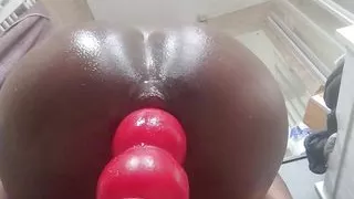 Oiled ass Stretched on Red Dildo