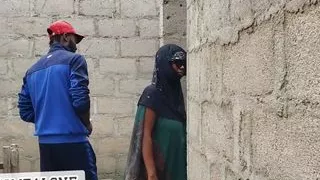 Big-titted Nigerian slut fucking in an uncompleted building.