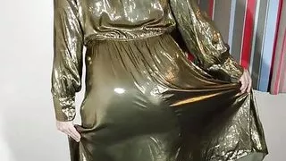 hot television  crossdresser in super silky gold shiny dress