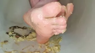 smashing bananas with feet