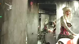 Pretty punk blonde femdoms dominate a bound guy