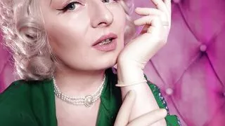 ASMR: latex medical gloves and green PVC coat - sexy pin up MILF Glaminatrix Arya Grander - free vid