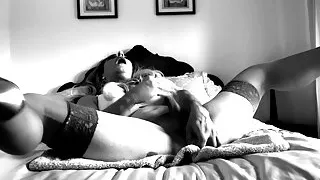 Black & White masterbating with dildo