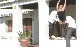 Ebony whore sucks white dick while getting banged from the back