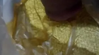 Indien man pee In a plastic bag