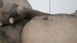 man alone at home big black dick, in a moment of pleasure caressing himself with his big member