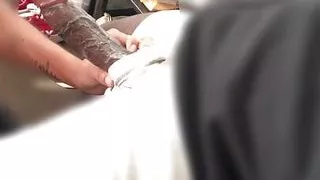 Her throat is still wrestling with my dick. My cock is all the way in the back of her tonsils.