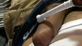 boy is experimenting with his toothbrush