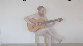 DJ Phuzzy plays guitar naked