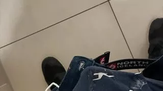 boy is wanking in mall stall bathroom
