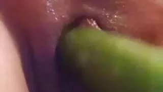 Cucumber inside pussy