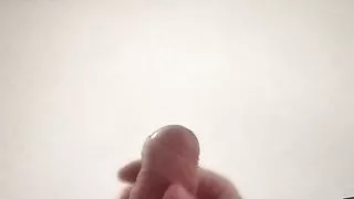 Guy jerking off uncircumcised cock on the table  #13