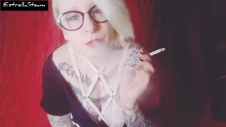 Blonde Smokes A Cigarette While Staring At You