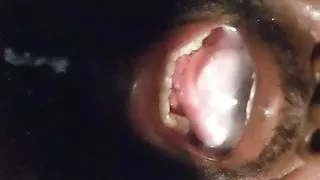 Cum rolls down my tongue