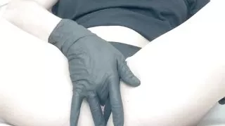 cutie teases her pussy in gloves