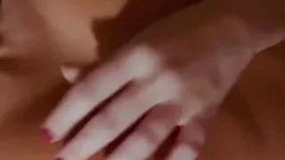 Girl caresses her nipples