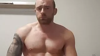 muscular guy is jerking off in home