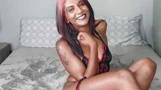 Tattooed desi babe in a sexy lingerie outfit giving JOI and CEI