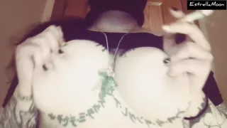 Girl With A Mask Plays With Her Tits And Smokes A Cigarette