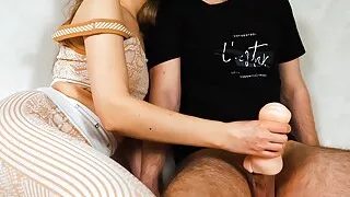 A beauty in a tracksuit caught her husband with a masturbator and decided to help him finish.