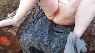 Labia punishment on woodpile