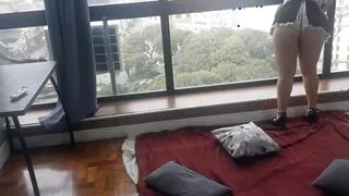Fucking the hot maid at the window for everyone to watch