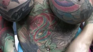 Heavily Tattooed And Pierced Biker Chick Black Widow Sucks