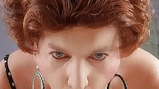 Redheaded granny tranny sucks it!