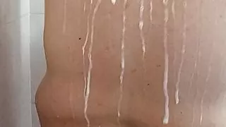 Chubby bator playing in the shower nipples