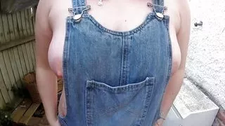 Wife in wellingtons and dungarees in the yard