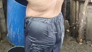 Hot indian bhabhi bathing outside