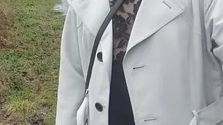 Crossdresser takes a walk on a windy lane