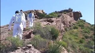 Astronaut stud lands on a planet where a blonde primitive babe sucks his cock outdoors