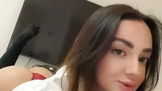 Hot girl in bathrobe using a vibrator