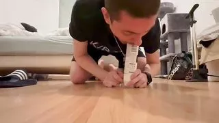 Submissive sucking a tube of shaving foam