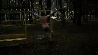 Preparation for long crucifixion by night naked in public park