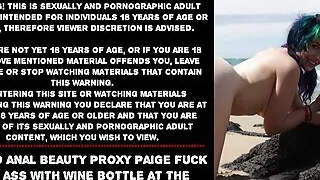 Naked anal beauty Proxy Paige fuck her ass with wine bottle at the beach