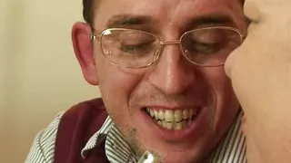 Busty brunette granny gets two dicks