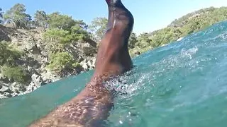 nylondelux in stocking red toes at the seaside